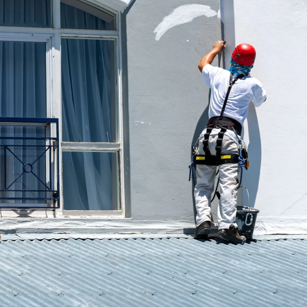 Dedicated Charlotte Painting Pros team enhancing a home's exterior with expert painting services, boosting curb appeal in Charlotte, NC